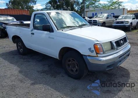 1999 Nissan Frontier Xe z USA, uszkodzony, nr VIN 1N6DD21S8XC318584